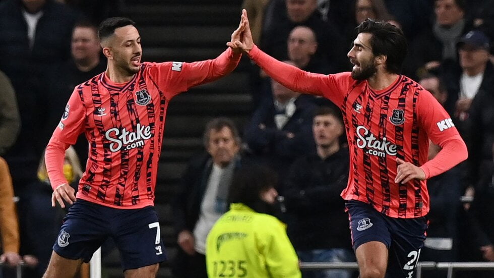 Andre Gomes (right) celebrates his goal with team-mate Dwight McNeil
