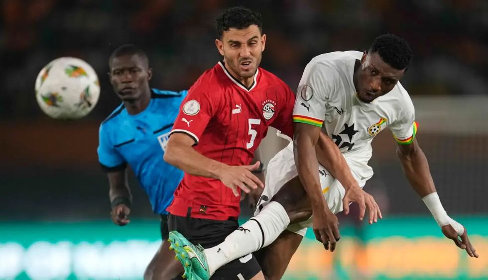 Ghana and Egypt foodball players