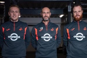 Luke Williams (centre) is joined at Swansea by two members of his Notts County staff, George Lawtey (left) and Ryan Harley (right)