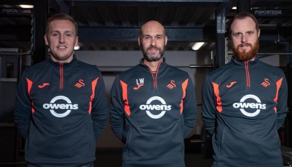 Luke Williams (centre) is joined at Swansea by two members of his Notts County staff, George Lawtey (left) and Ryan Harley (right)