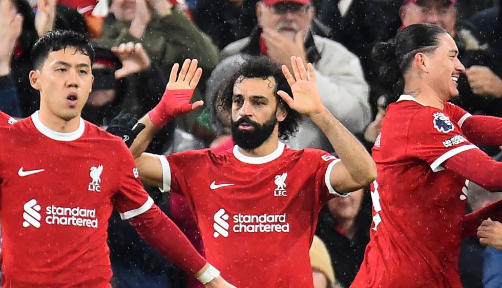 Mo Salah celebrates with his Liverpool team-mates