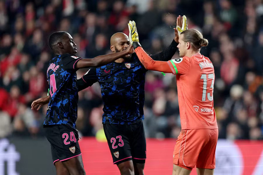 Sevilla celebrate their three points on the road