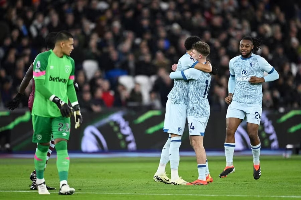 Dominic Solanke of AFC Bournemouth (obscured) celebrates scoring his team's first goal
