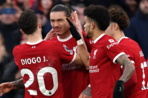 Liverpool beat Burnley to move top