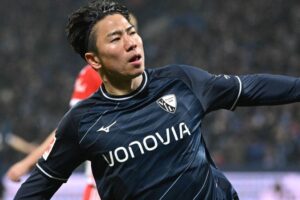 Takuma Asano celebrates after equalising for Bochum